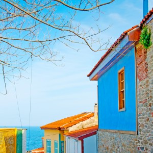 shutterstock_1271671372-Seaview between old houses in the old part of Kavala town in Greece.jpg